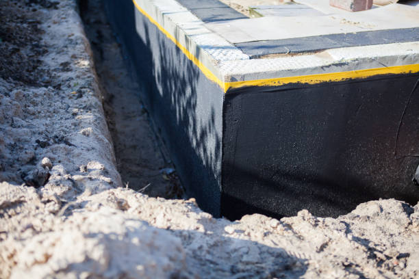 Professional Waterproofing technician working in Arlington, WI